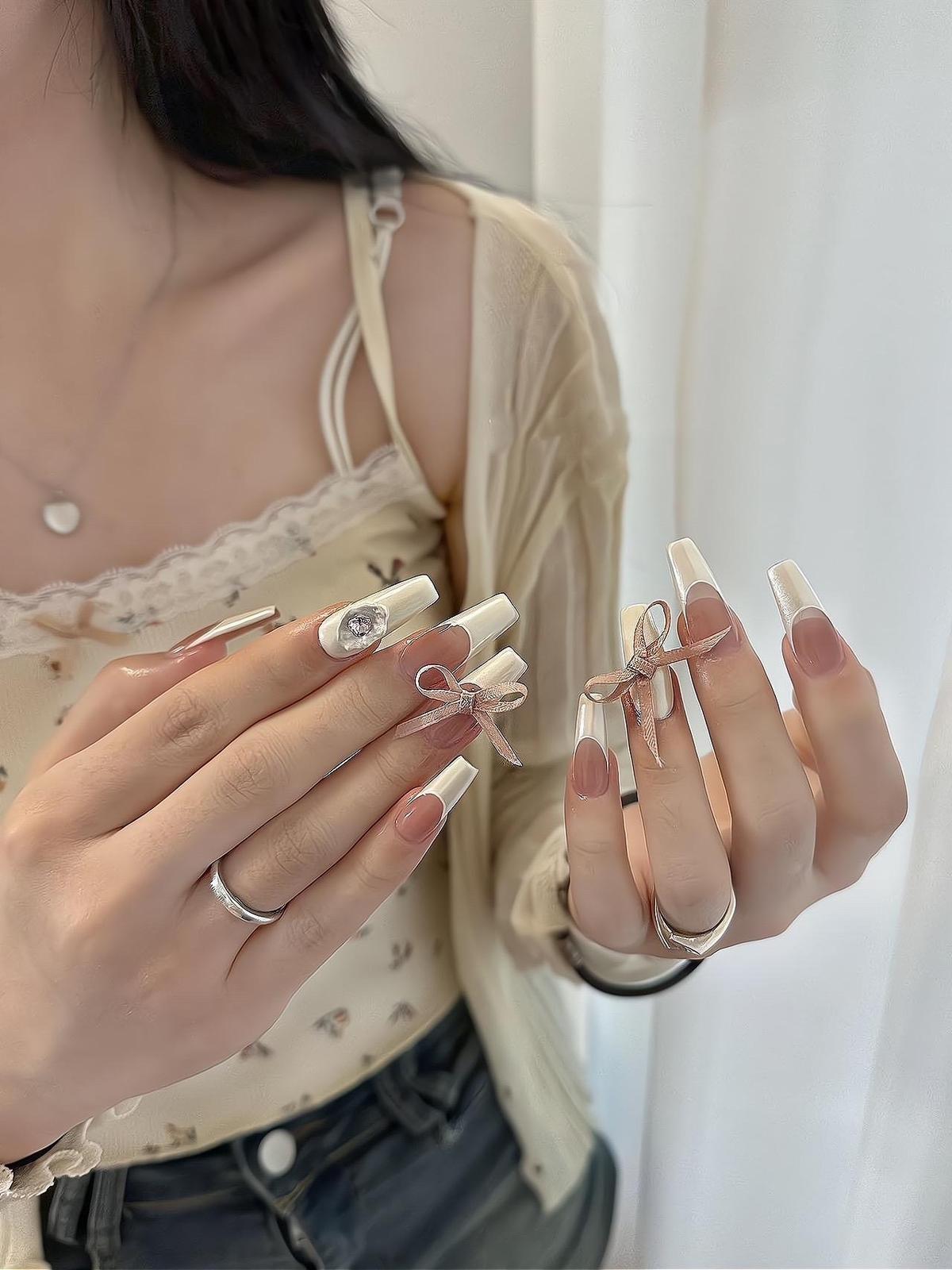 mẫu nail đính nơ mùa hè
