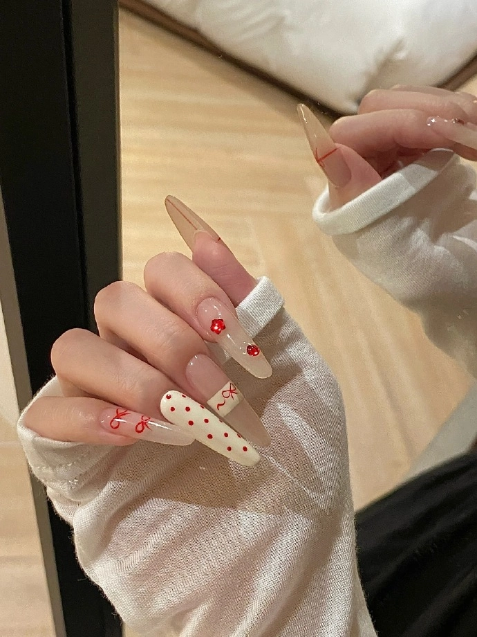 mẫu nail đính nơ đẹp móng dài