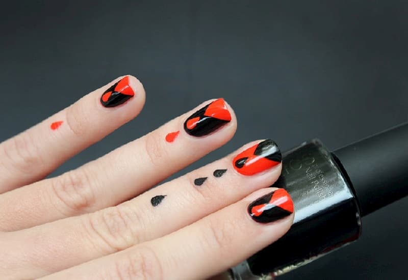 Mẫu nail màu đen cam độc đáo