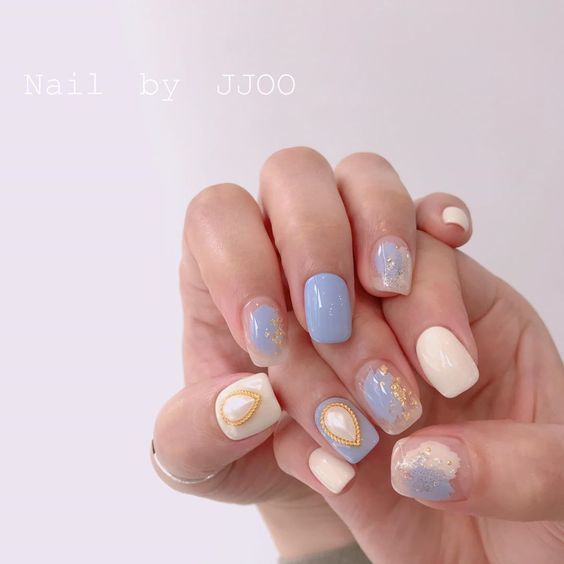 Mẫu nail màu xanh dương đính ngọc trai