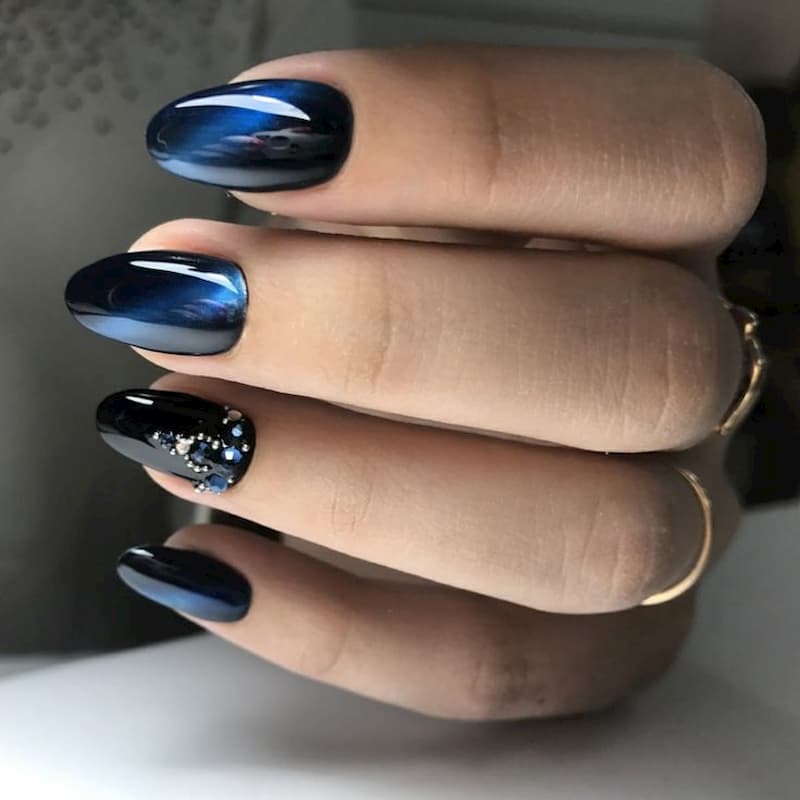 Mẫu nail mắt mèo màu xanh đen đẹp