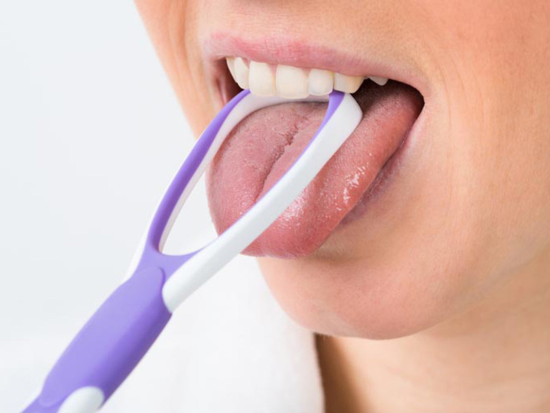 Tác dụng của cây vệ sinh lưỡi khi chăm sóc răng miệng là gì?